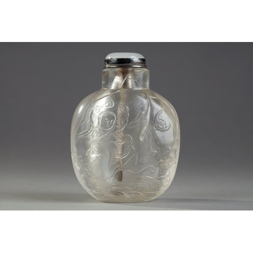 Rock crystal snuff bottle sculpted in low relief with liu hai, bat, crane